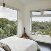 Master bedroom with Andersen 100 series windows, Plumen 003 Dimmable LED Pendant Set, Rich Brilliant Willing Seed ceiling sconce, Modern Fan Cirrus Flush fan and really comfortable Tuft & Needle eco-foam mattress. View of the gulch.
